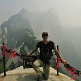 Hua Shan  Huashan, another holy mountain (this one for the Taoists) is spectacular - or rather: would be spectacular if you were able to properly see it. When I was standing at the foot of the mountain, I could not see any of it. Once reaching the north peak, you could at least spot them through the haze (a.k.a. smog).